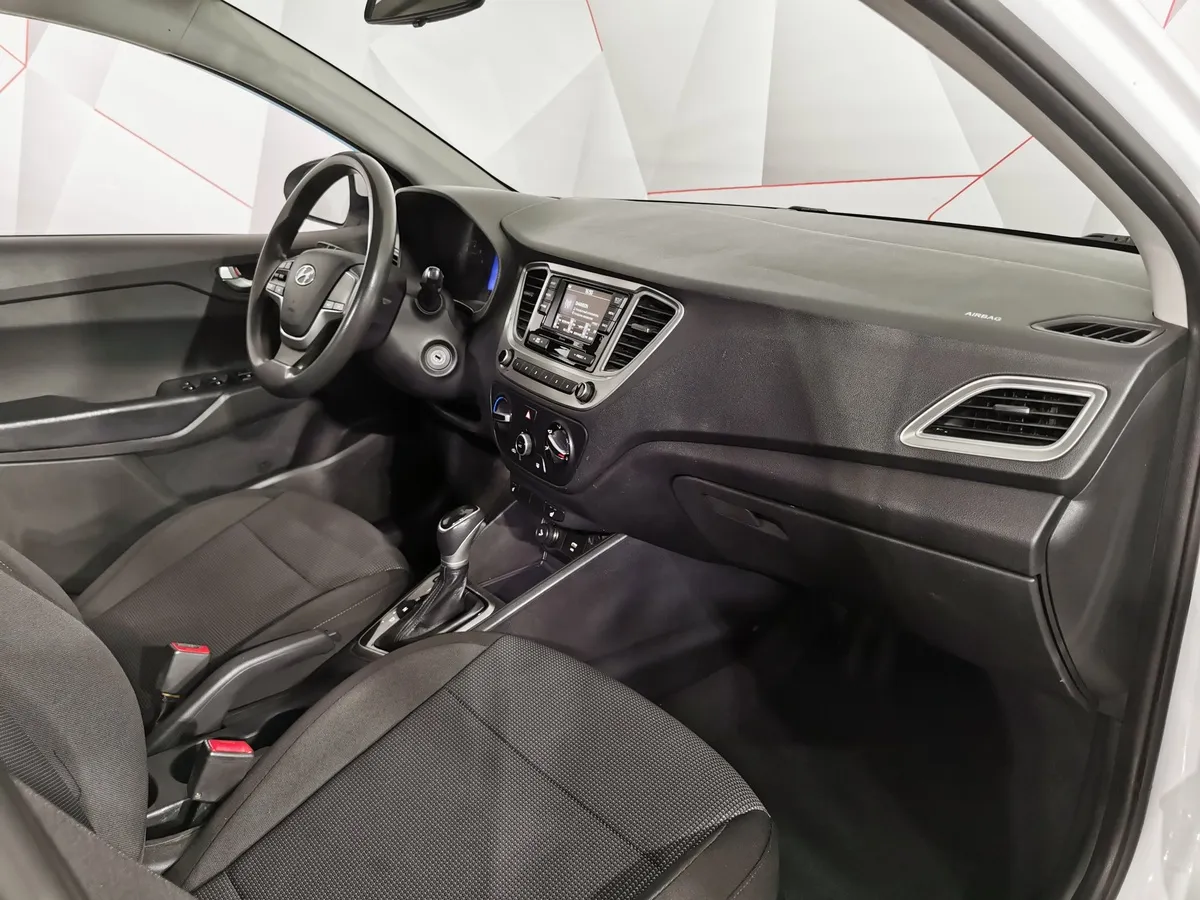 Hyundai Solaris 1.6 AT (123 л.с.) Comfort Белый в АВИЛОН. Слайд №11