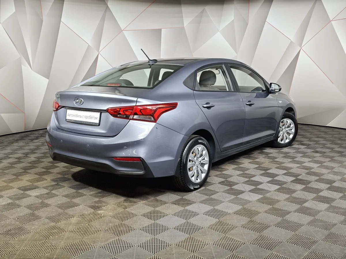 Hyundai Solaris 1.4 AT (100 л.с.) Active Plus Серый в АВИЛОН. Слайд №2