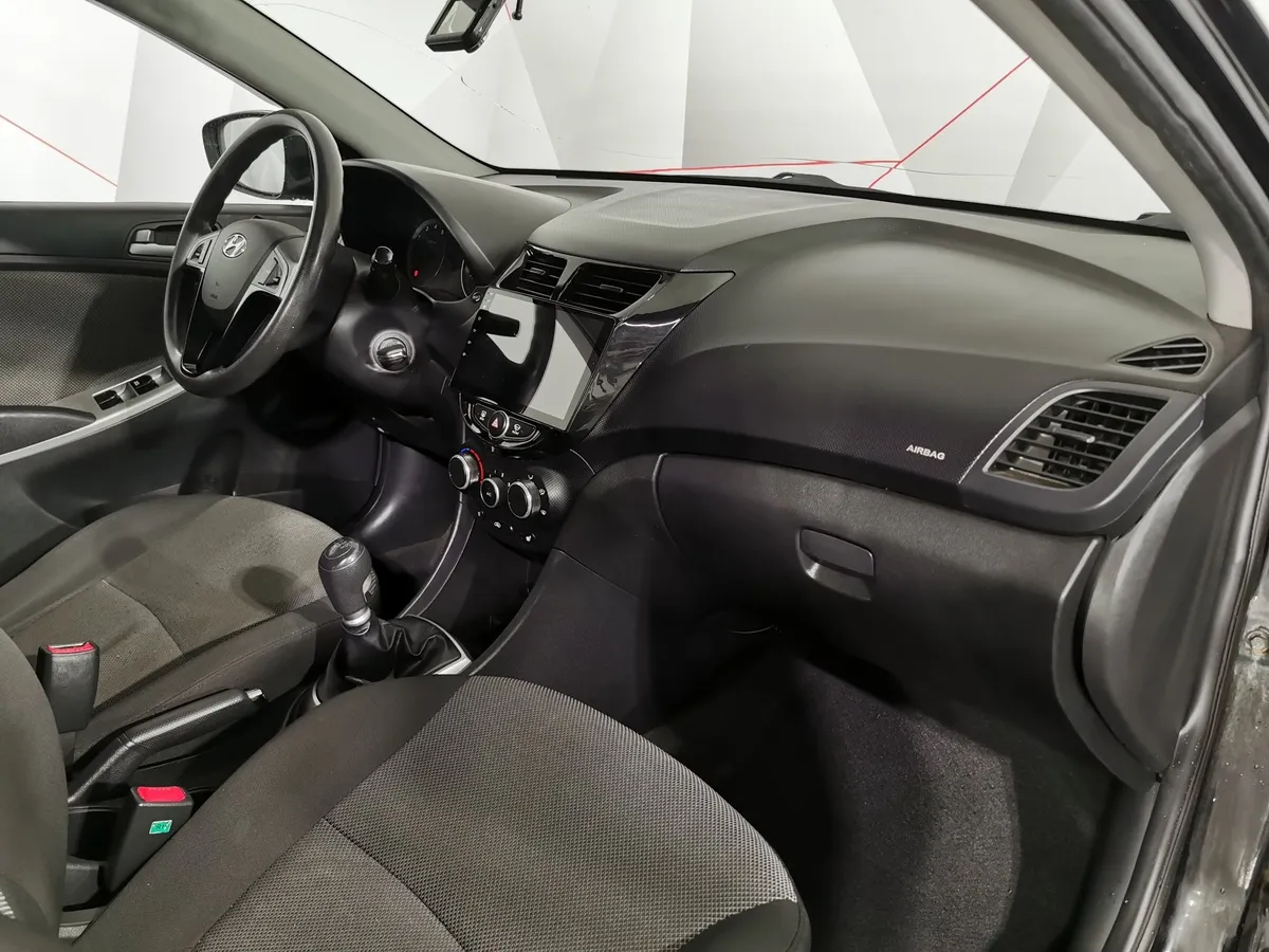 Hyundai Solaris 1.4 MT (107 л.с.) Active Черный в АВИЛОН. Слайд №12