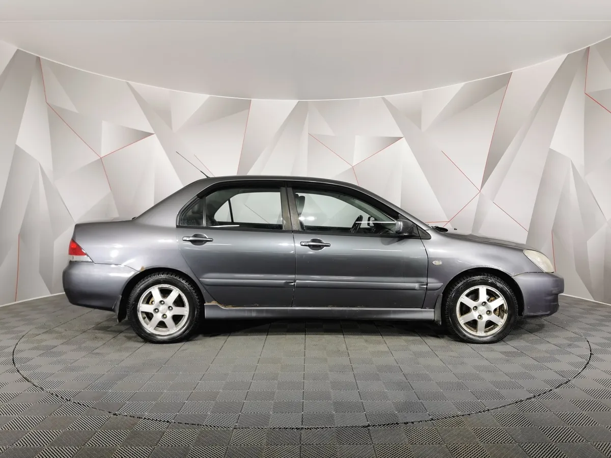 Mitsubishi Lancer 1.6 AT (98 л.с.) Серый в АВИЛОН. Слайд №6