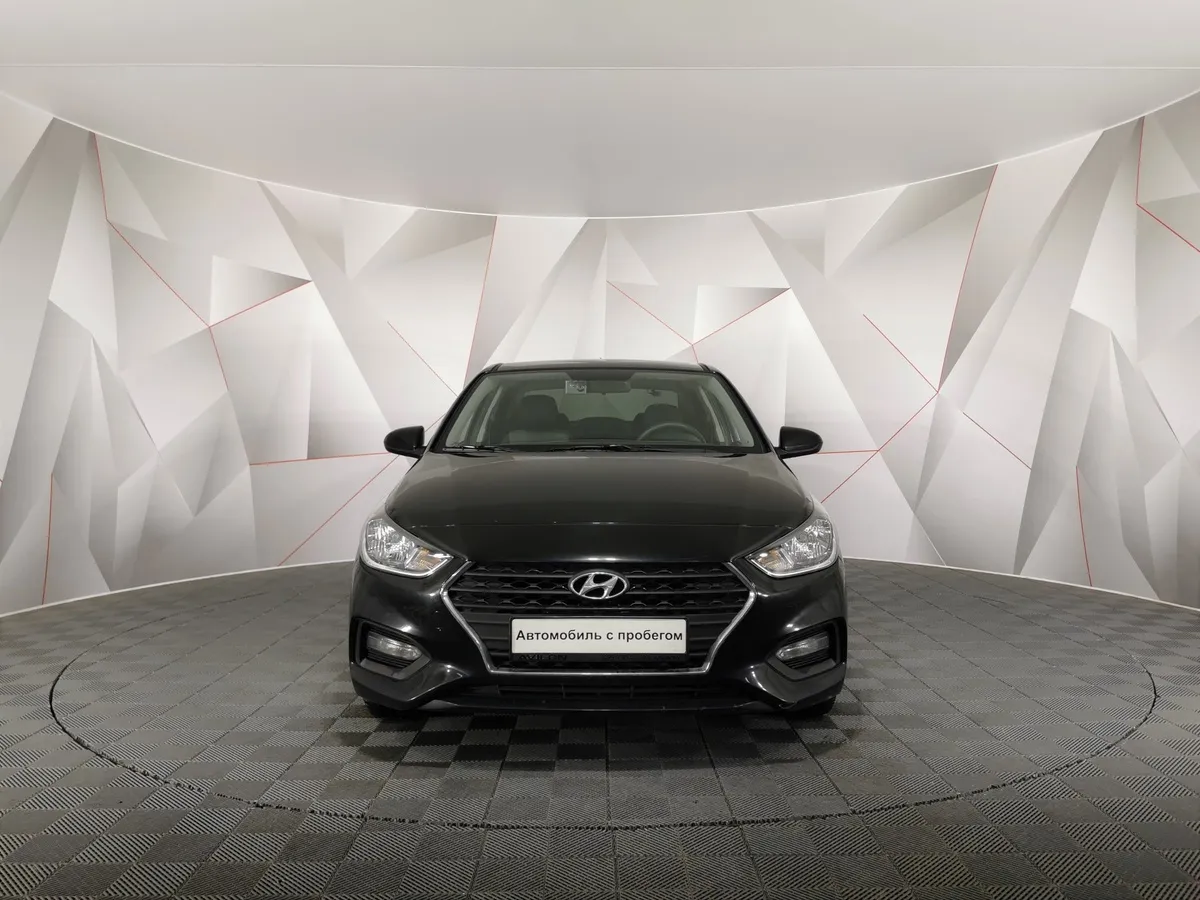Hyundai Solaris 1.6 AT (123 л.с.) Comfort + Advanced + Winter Черный в АВИЛОН. Слайд №7