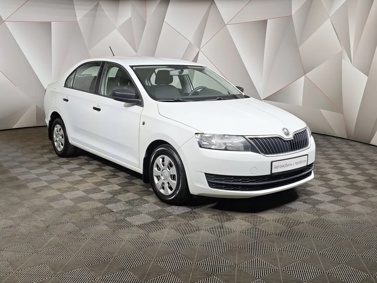 Skoda Rapid 1.6 MT (90 л.с.) Белый в АВИЛОН. Слайд №3