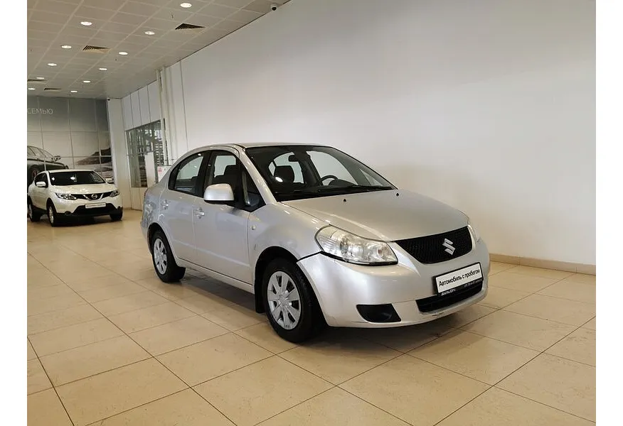 Suzuki SX4 1.6 MT (107 л.с.) Серебристый в АВИЛОН. Слайд №3