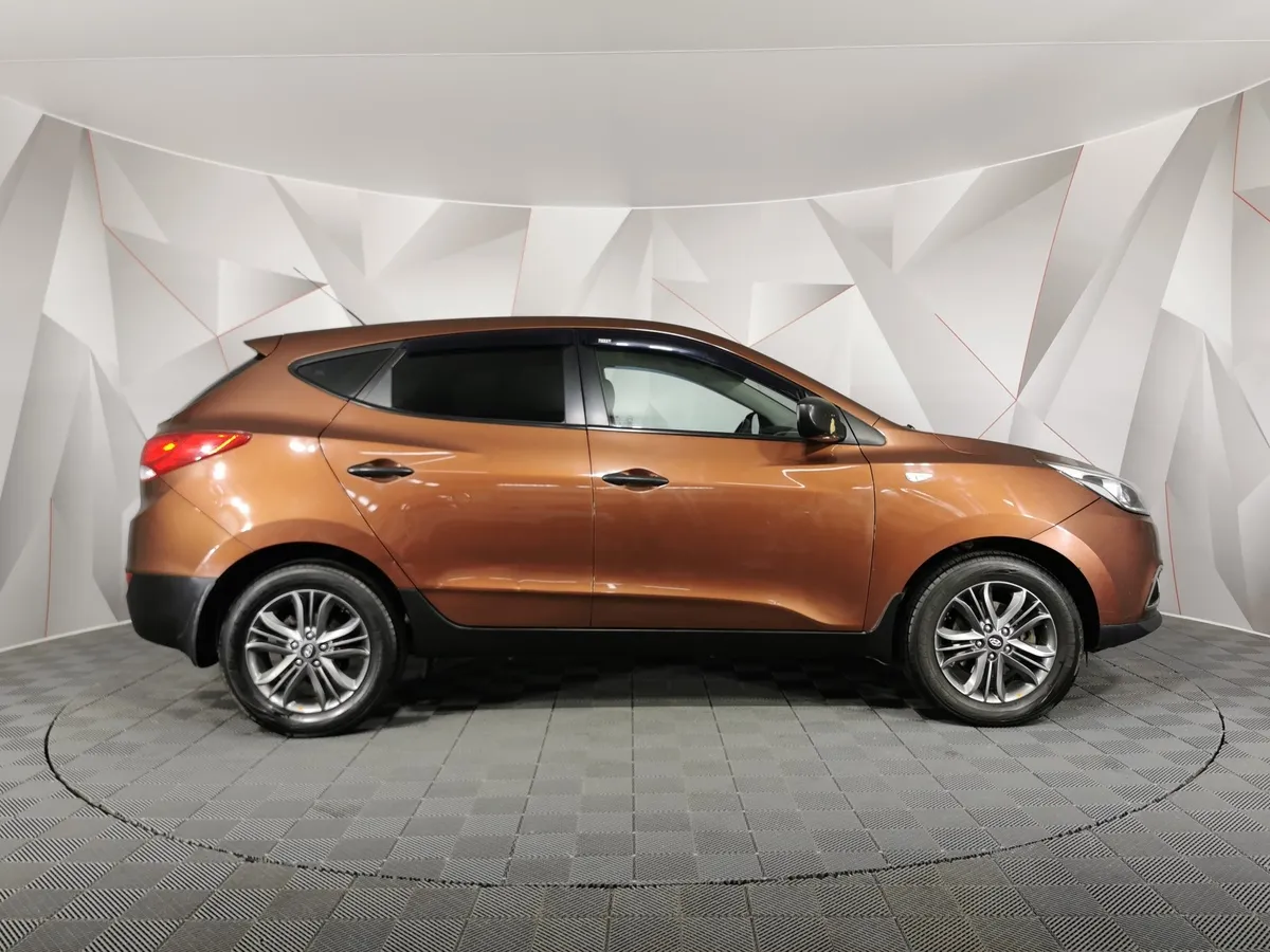 Hyundai ix35 2.0 AT (150 л.с.) Коричневый в АВИЛОН. Слайд №6