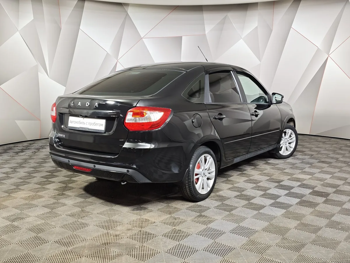 ВАЗ (Lada) Granta 1.6 MT (90 л.с.) Comfort Черный в АВИЛОН. Слайд №2
