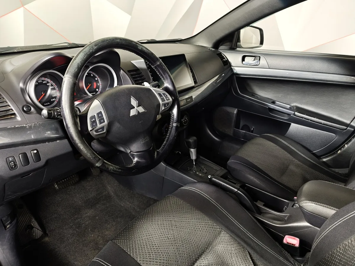 Mitsubishi Lancer 1.8 CVT (143 л.с.) Черный в АВИЛОН. Слайд №17