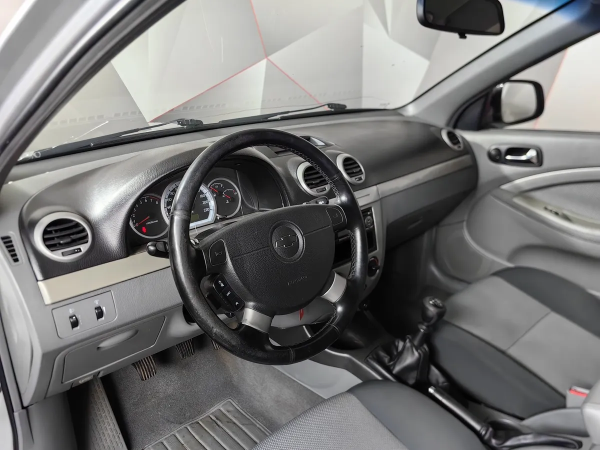 Chevrolet Lacetti 1.4 MT (95 л.с.) Серебристый в АВИЛОН. Слайд №16