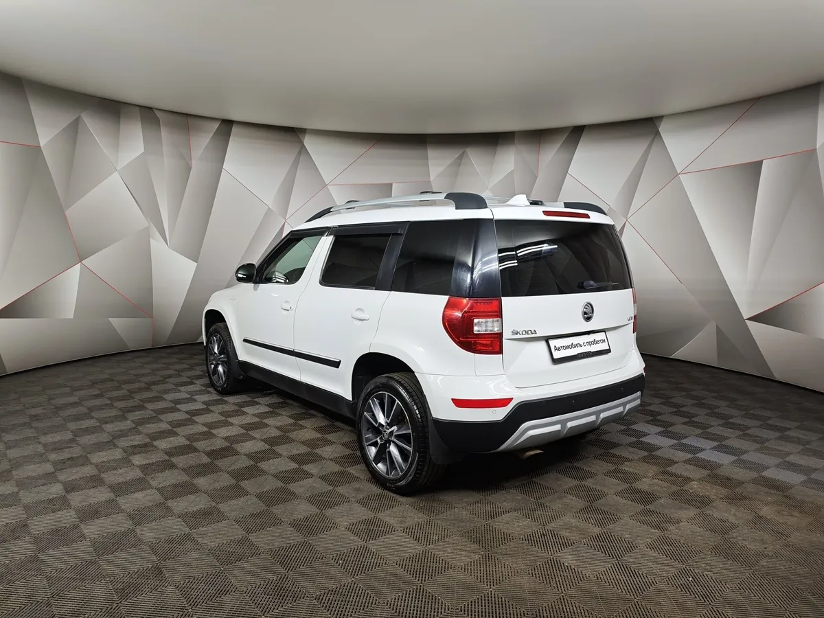 Skoda Yeti 1.6 AT (110 л.с.) Белый в АВИЛОН. Слайд №4