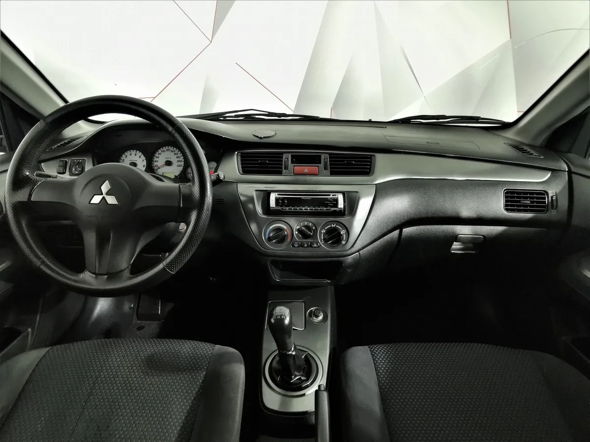 Mitsubishi Lancer 1.6 MT (100 л.с.) Синий в АВИЛОН. Слайд №12