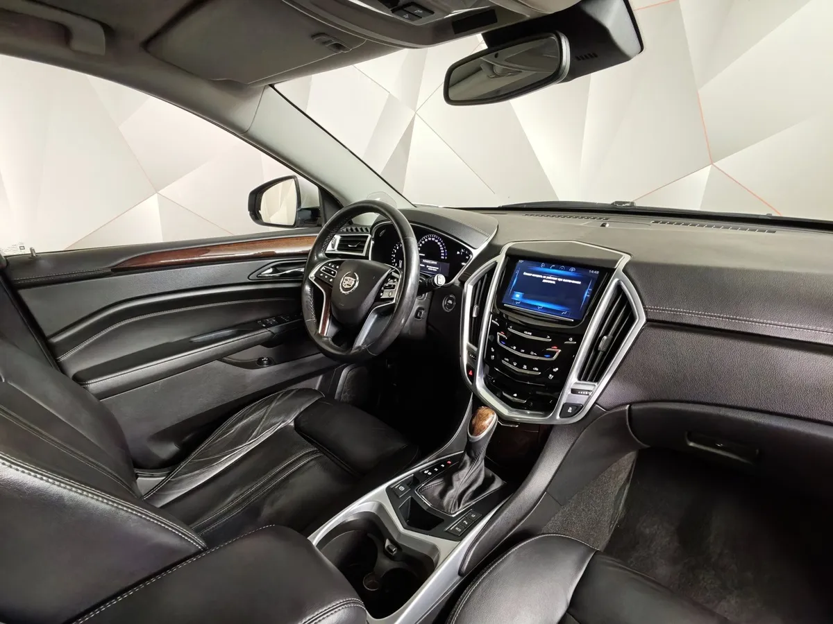 Cadillac SRX 3.6 AT AWD (318 л.с.) Белый в АВИЛОН. Слайд №11
