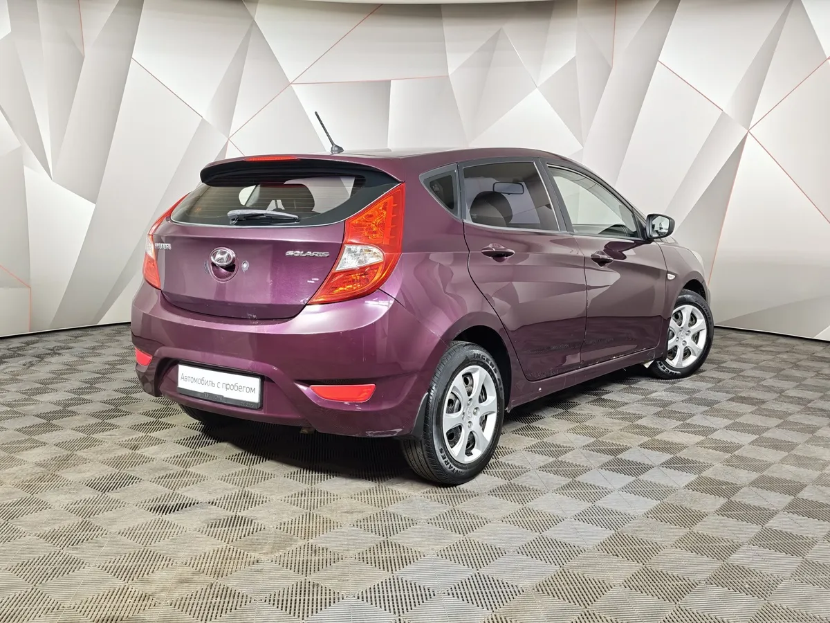 Hyundai Solaris 1.4 AT (100 л.с.) Comfort Фиолетовый в АВИЛОН. Слайд №2