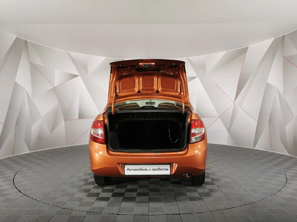 ВАЗ (Lada) Granta 1.6 AT 16кл (98 л.с.) Оранжевый в АВИЛОН. Слайд №11