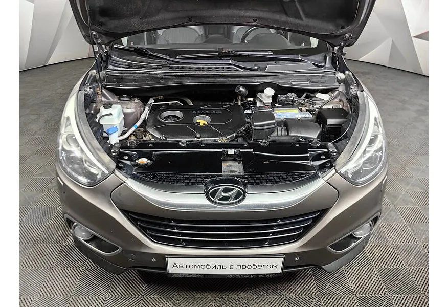 Hyundai ix35 2.0 AT 4WD (150 л.с.) Travel Коричневый в АВИЛОН. Слайд №11