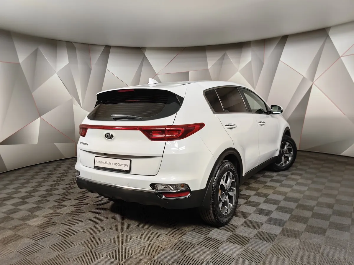 Kia Sportage 2.0 MPI AT 4WD (150 л.с.) Comfort Белый в АВИЛОН. Слайд №2