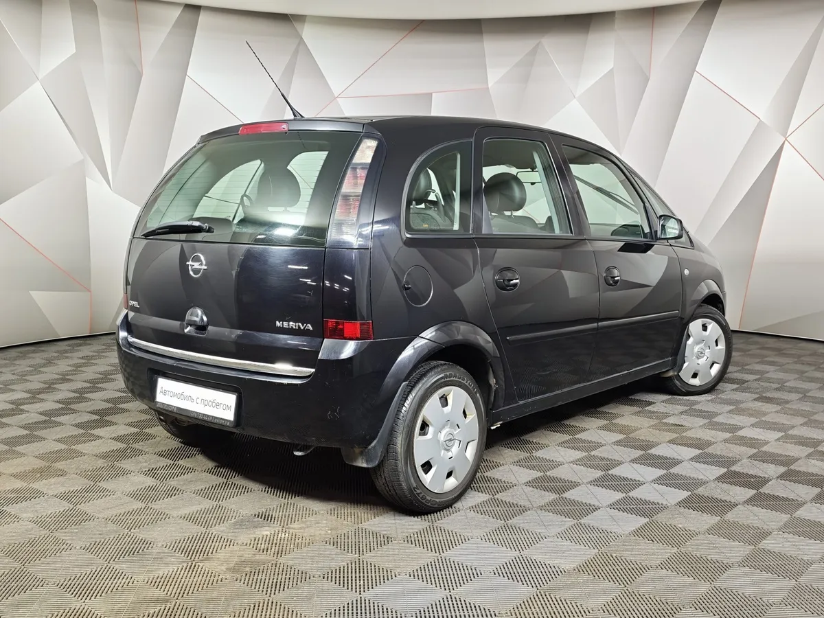 Opel Meriva 1.6 Twinport MT (105 л.с.) Черный в АВИЛОН. Слайд №2