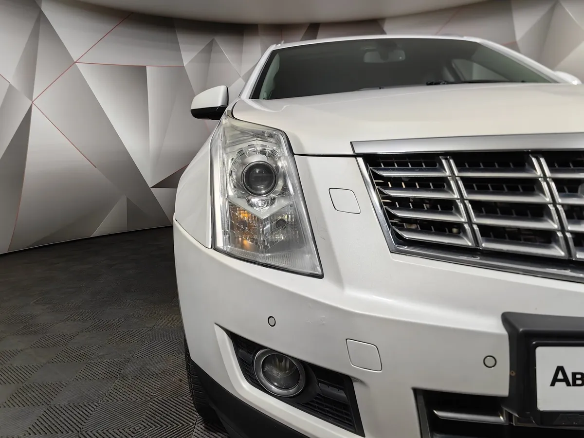 Cadillac SRX 3.0 AT (249 л.с.) Белый в АВИЛОН. Слайд №9