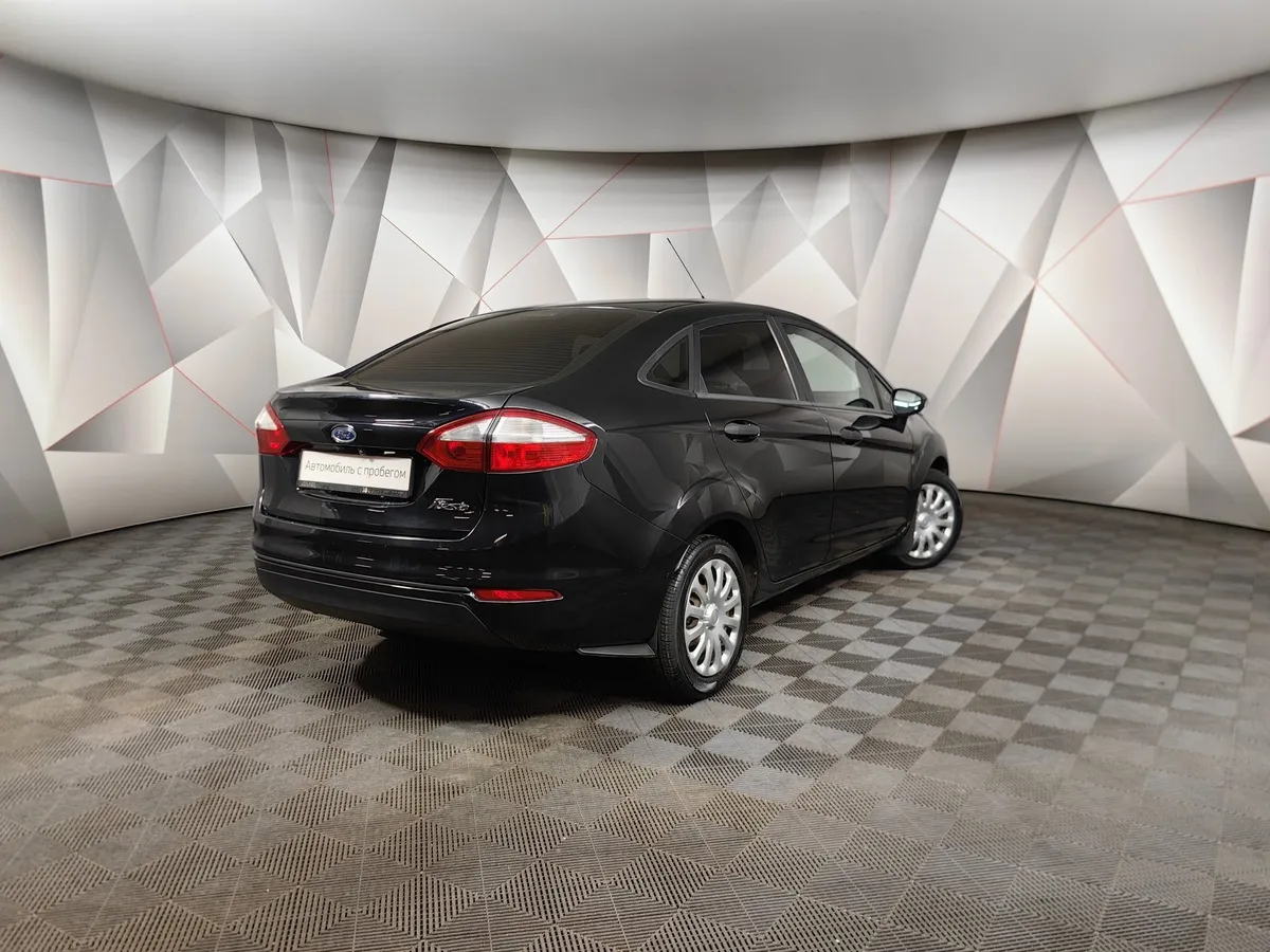 Ford Fiesta 1.6 Ti-VCT MT (85 л.с.) Ambiente Черный в АВИЛОН. Слайд №2