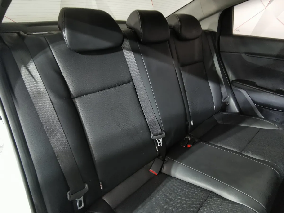 Kia Rio 1.6 AT (123 л.с.) Белый в АВИЛОН. Слайд №16