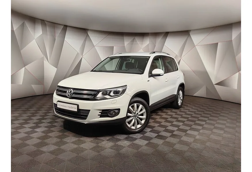 АВИЛОН - Volkswagen Tiguan 1.4 TSI BlueMotion DSG (150 л.с.) Sport & Style Белый - slide 0