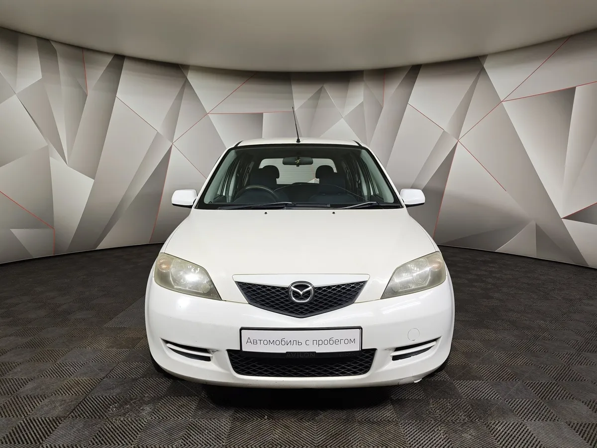 Mazda Demio 1.5 AT (100 л.с.) Белый в АВИЛОН. Слайд №7