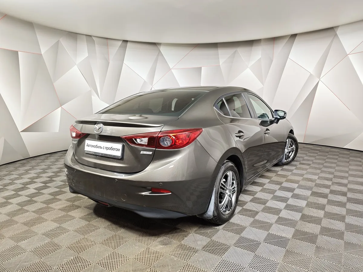 Mazda 3 1.6 AT (104 л.с.) Коричневый в АВИЛОН. Слайд №2