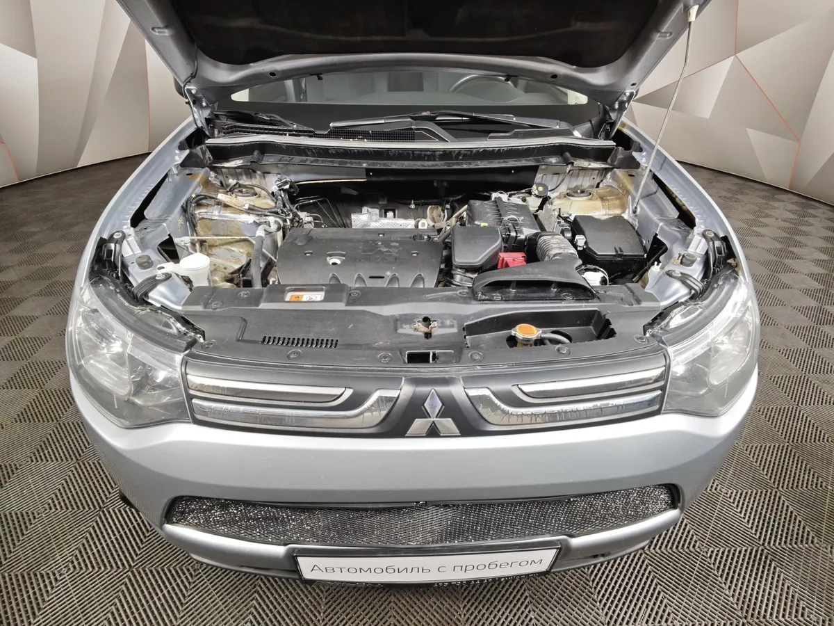 Mitsubishi Outlander 2.0 CVT (146 л.с.) Invite Серебристый в АВИЛОН. Слайд №11