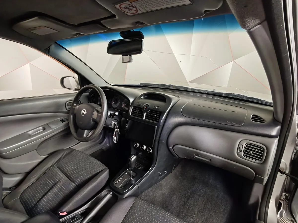 Nissan Almera Classic 1.6 AT (107 л.с.) Серебристый в АВИЛОН. Слайд №10