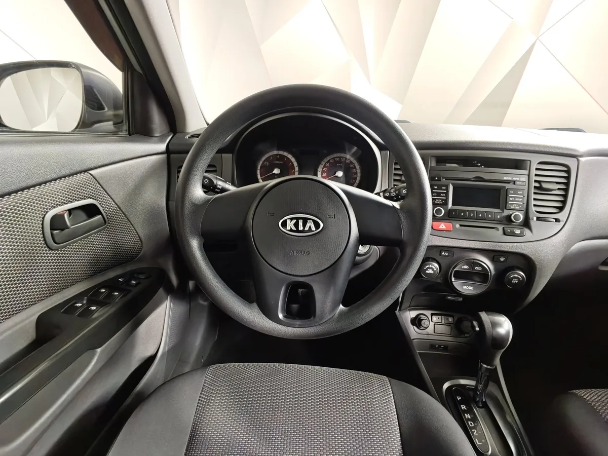 Kia Rio 1.4 AT (97 л.с.) Classic Серый в АВИЛОН. Слайд №20