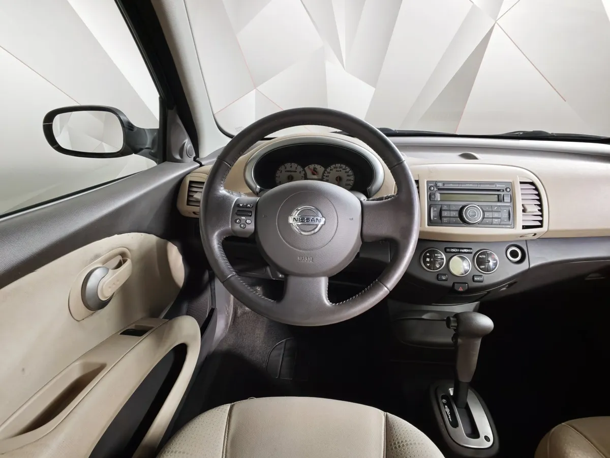 Nissan Micra 1.4 AT (88 л.с.) Черный в АВИЛОН. Слайд №19