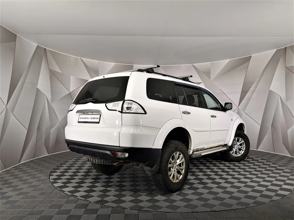 Mitsubishi Pajero Sport 2.5 DI-D AT AWD (178 л.с.) Белый в АВИЛОН. Слайд №2