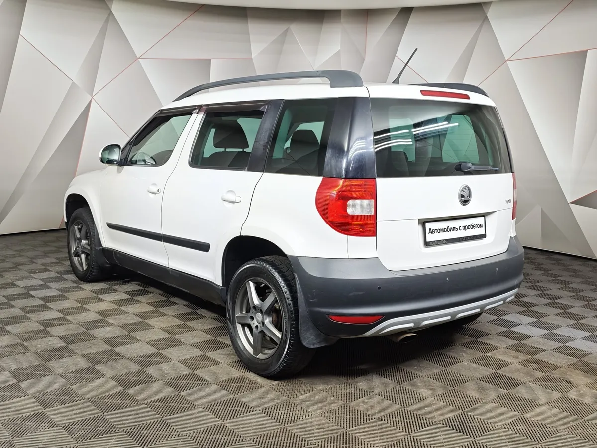 Skoda Yeti 1.2 TSI DSG (105 л.с.) Active Белый в АВИЛОН. Слайд №4