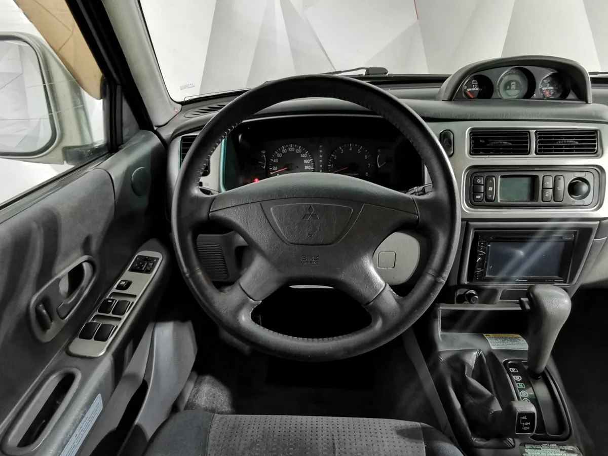 Mitsubishi Pajero Sport 3.0 AT (170 л.с.) Бежевый в АВИЛОН. Слайд №19