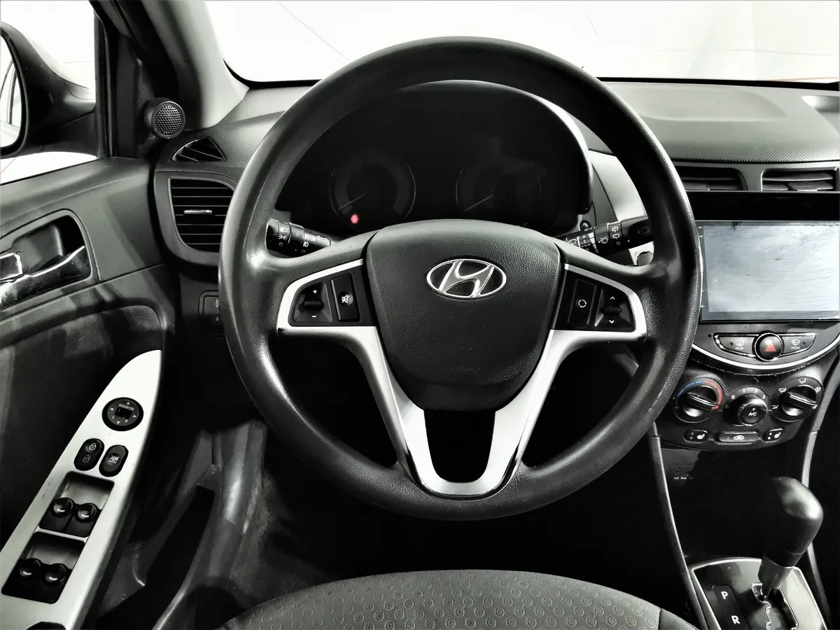 Hyundai Solaris 1.4 AT (107 л.с.) Active Бежевый в АВИЛОН. Слайд №19