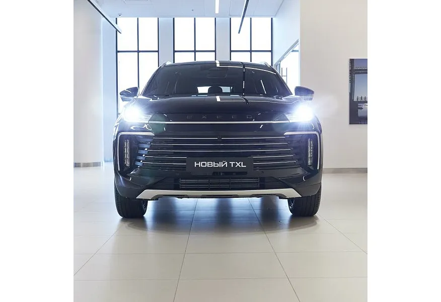 EXEED TXL 2.0 8AT AWD (197 л.с.) Flagship IOV Черный в АВИЛОН. Слайд №4