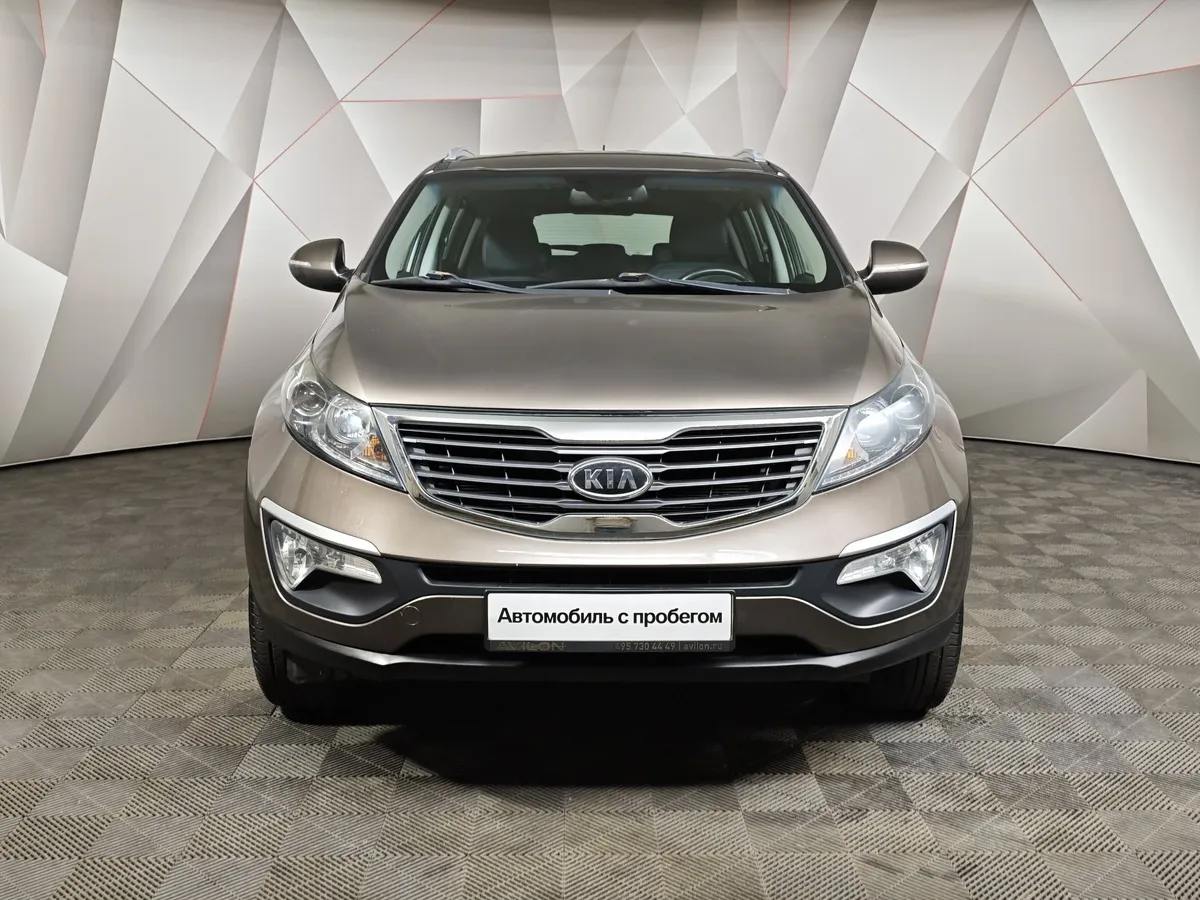 Kia Sportage 2.0 AT AWD (150 л.с.) Коричневый в АВИЛОН. Слайд №7