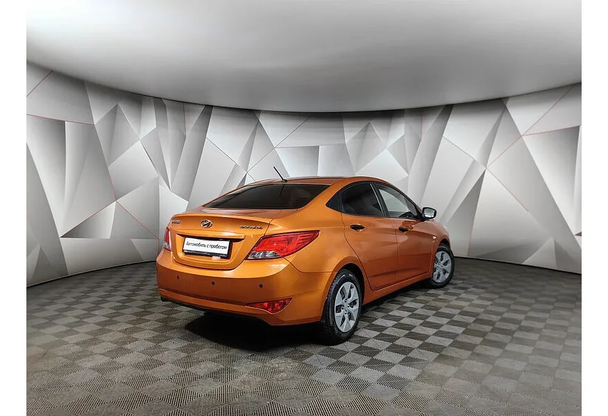 Hyundai Solaris 1.6 AT (123 л.с.) Comfort + Advanced + Winter Оранжевый в АВИЛОН. Слайд №2 Hyundai Solaris 1.6 AT (123 л.с.) Comfort + Advanced + Winter Оранжевый в АВИЛОН. Слайд №2