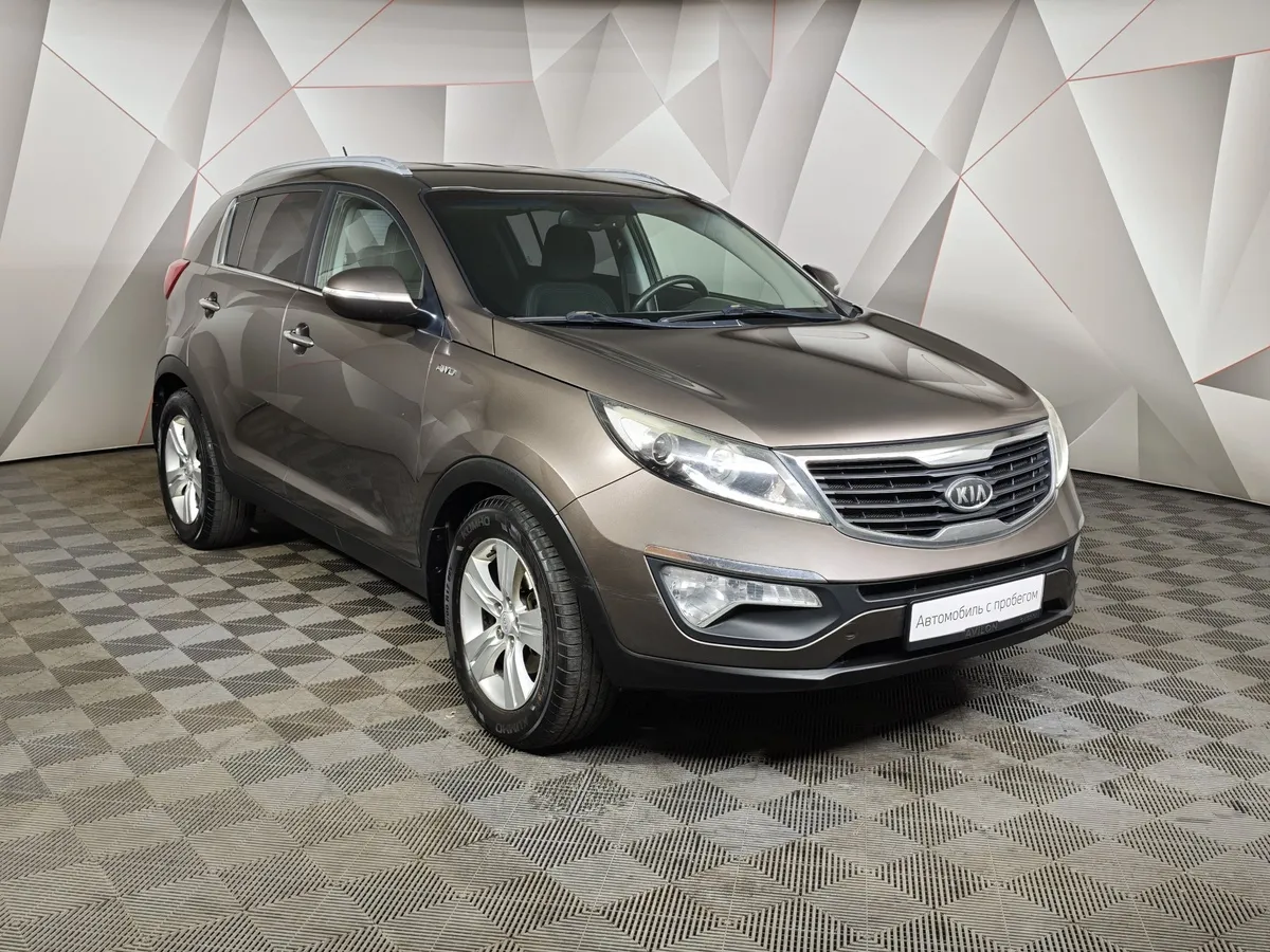 Kia Sportage 2.0 AT 4WD (150 л.с.) Luxe Коричневый в АВИЛОН. Слайд №3