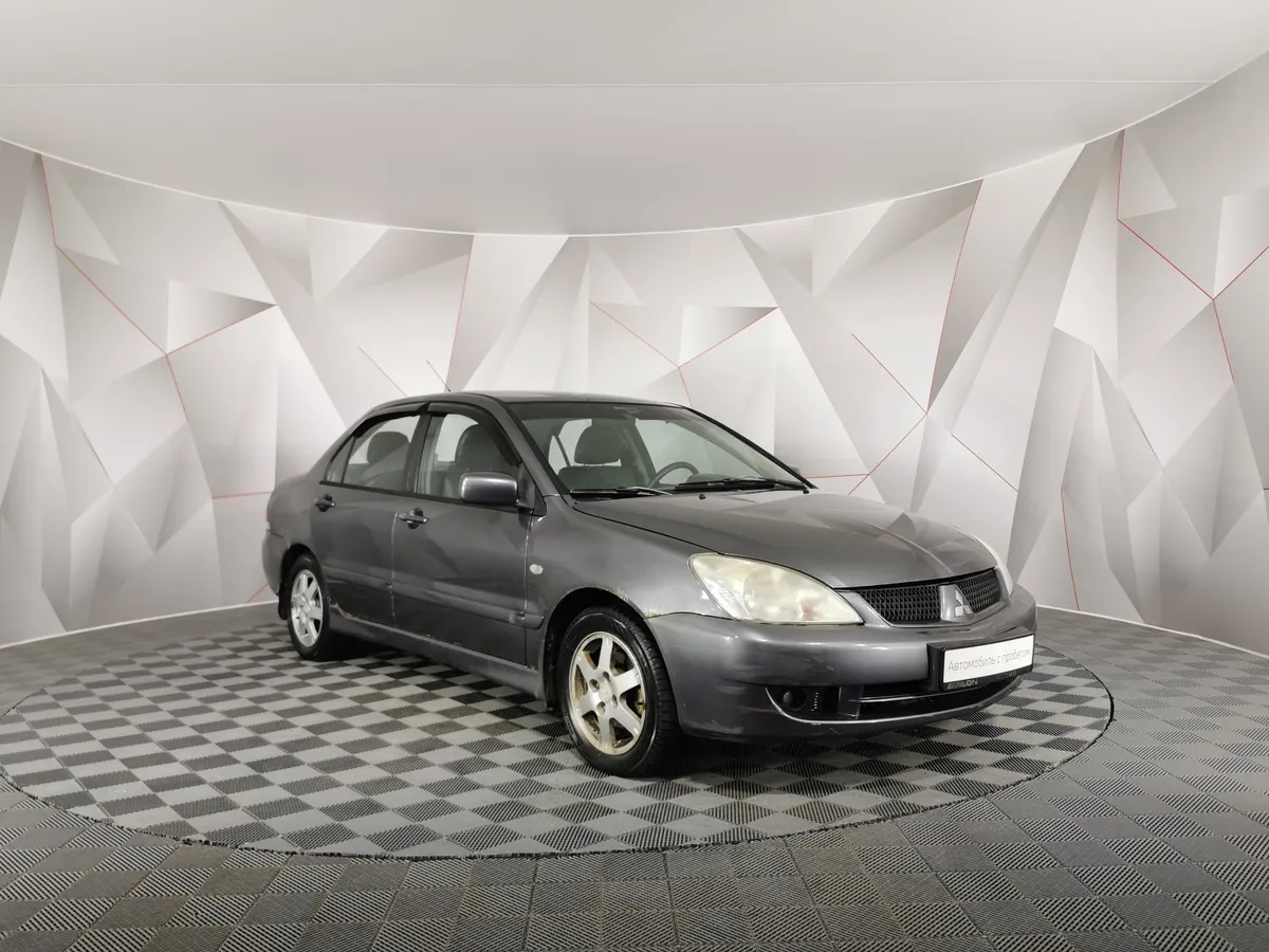Mitsubishi Lancer 1.6 AT (98 л.с.) Серый в АВИЛОН. Слайд №3