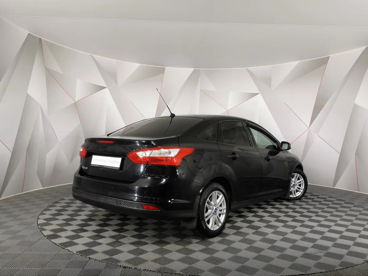 Ford Focus 1.6 PowerShift (125 л.с.) Titanium Черный в АВИЛОН. Слайд №2