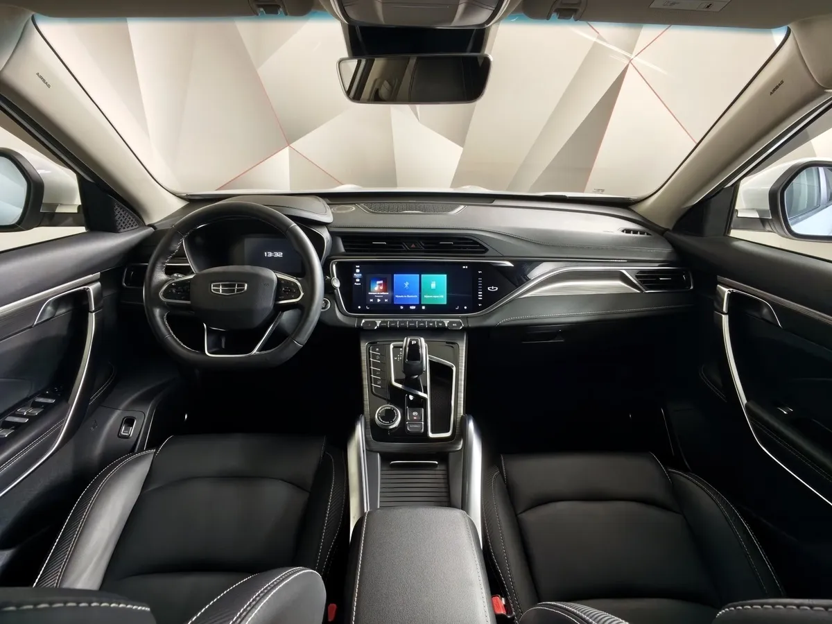 Geely Atlas Pro 1.5T 7DCT AWD (177 л.с.) Flagship Белый в АВИЛОН. Слайд №14