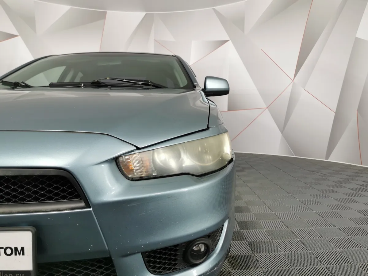 Mitsubishi Lancer 1.6 AT (117 л.с.) Зеленый в АВИЛОН. Слайд №10
