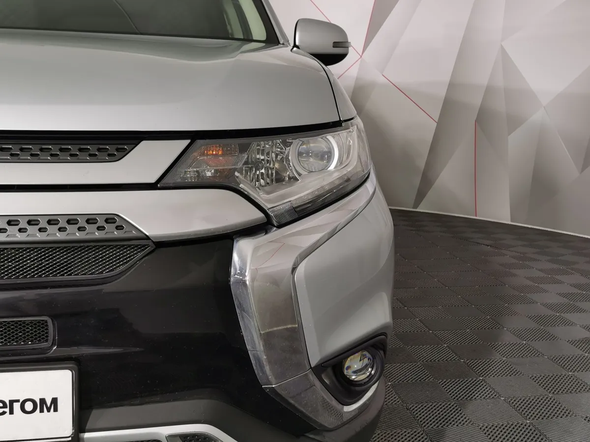 Mitsubishi Outlander 2.0 MIVEC CVT 4WD (146 л.с.) Invite Серебристый в АВИЛОН. Слайд №10