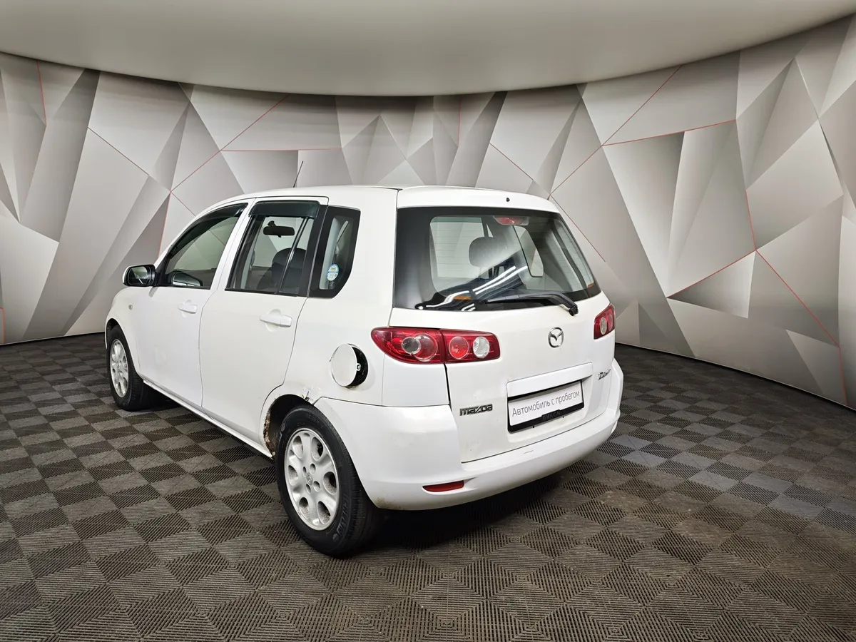 Mazda Demio 1.5 AT (100 л.с.) Белый в АВИЛОН. Слайд №4
