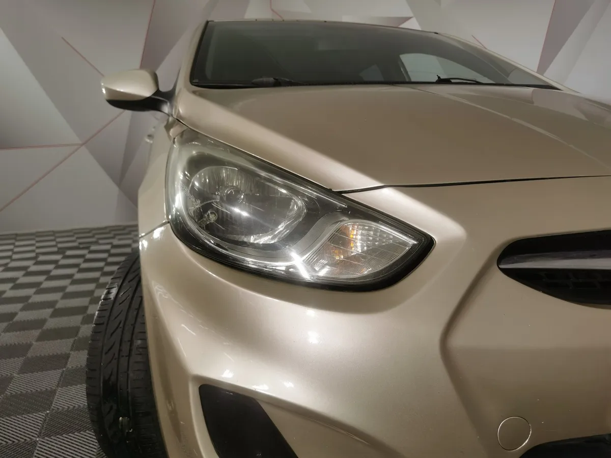 Hyundai Solaris 1.4 AT (107 л.с.) Active Бежевый в АВИЛОН. Слайд №10