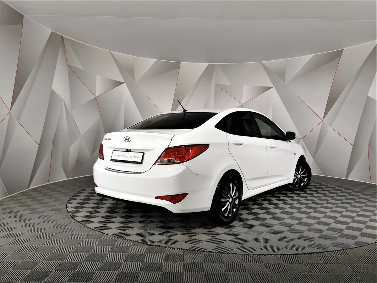Hyundai Solaris 1.6 MT (123 л.с.) Белый в АВИЛОН. Слайд №2