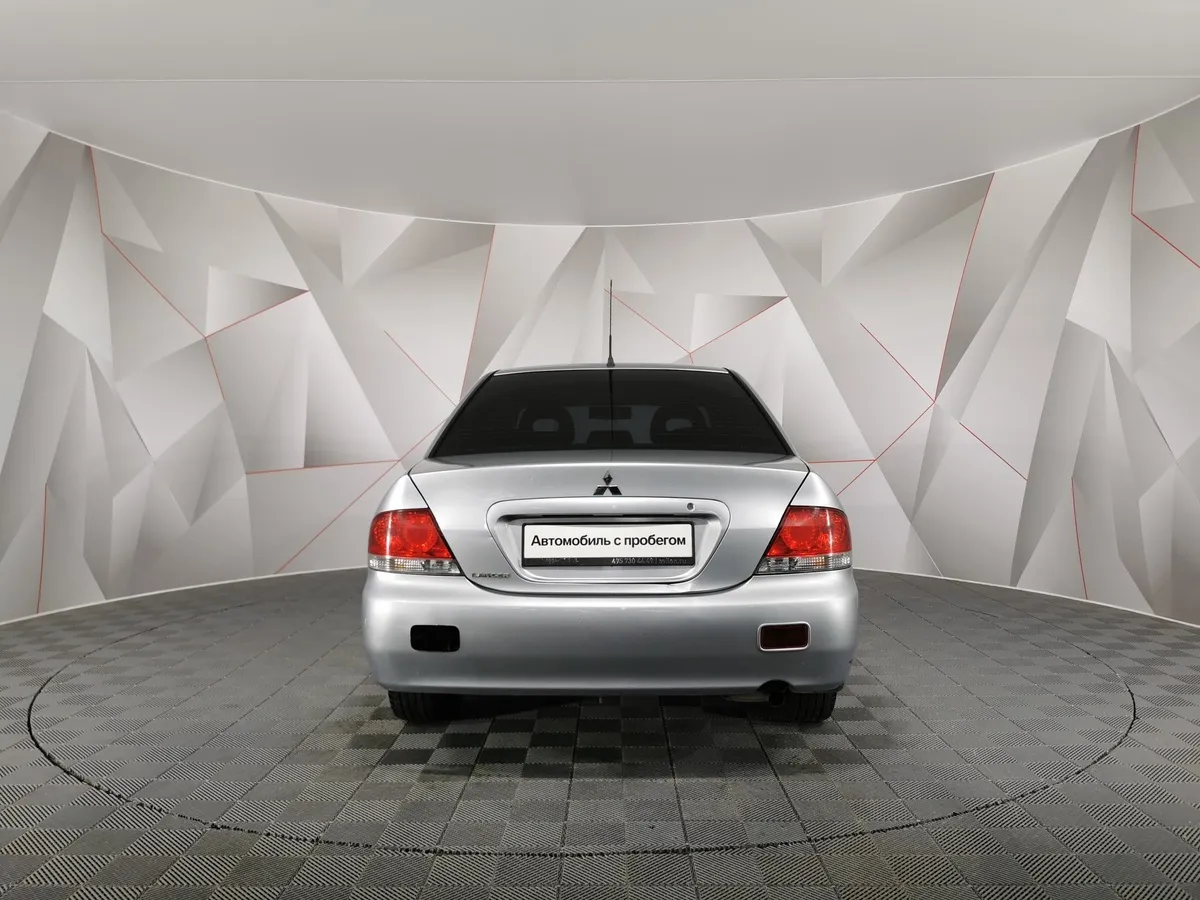 Mitsubishi Lancer 1.6 MT (98 л.с.) Серый в АВИЛОН. Слайд №8