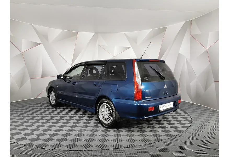 Mitsubishi Lancer 1.6 AT (98 л.с.) Синий в АВИЛОН. Слайд №7
