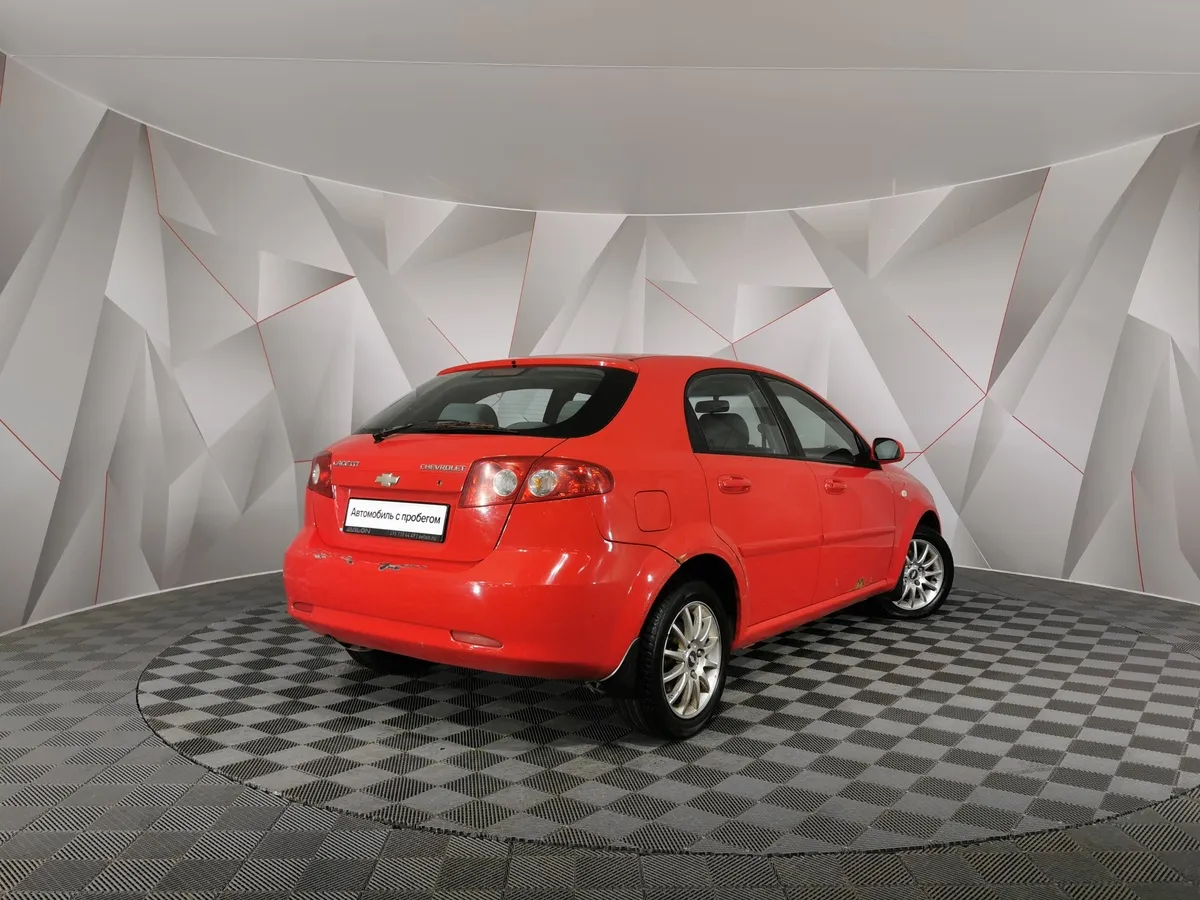 Chevrolet Lacetti 1.6 MT (109 л.с.) Красный в АВИЛОН. Слайд №2