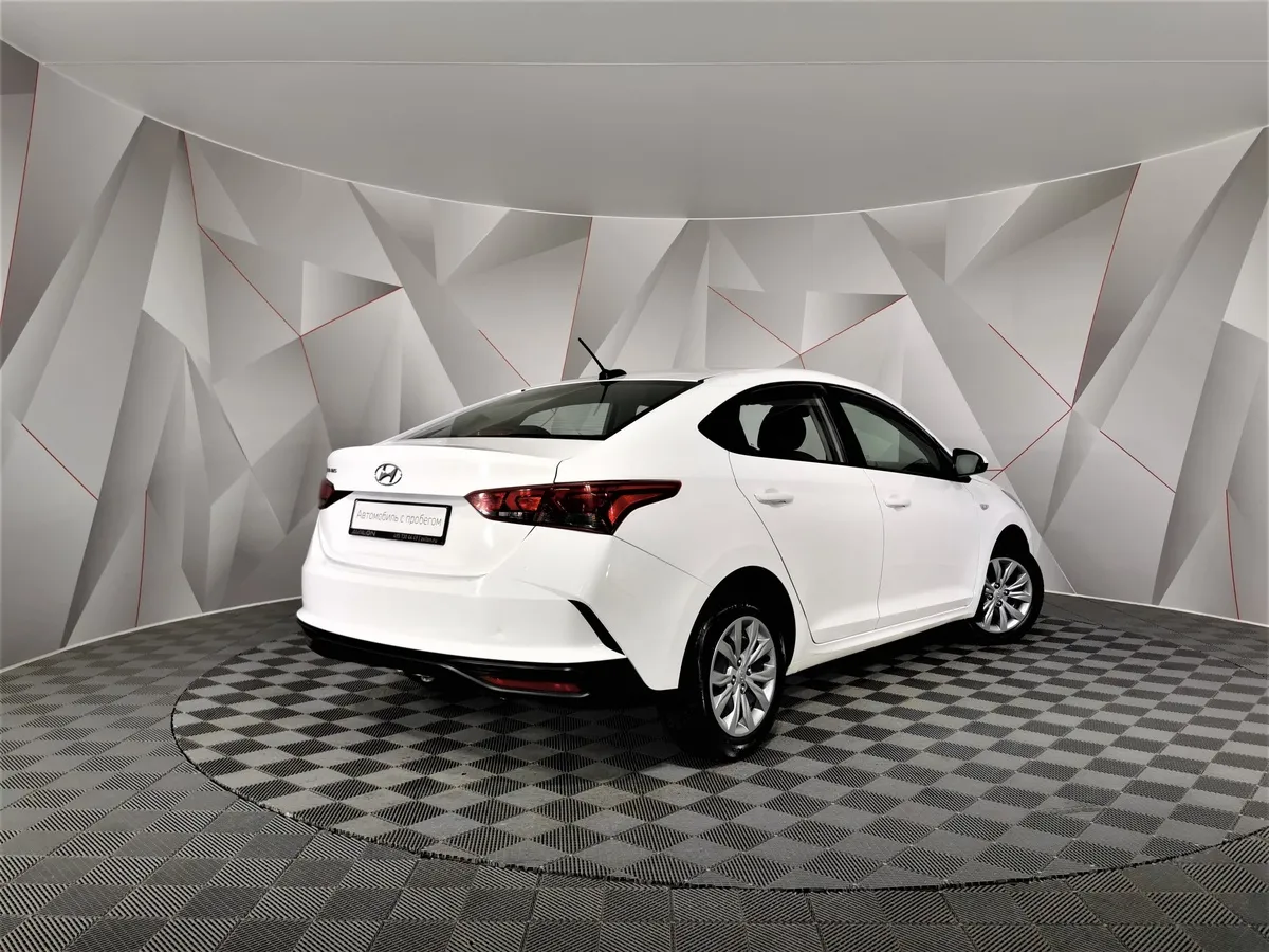 Hyundai Solaris 1.6 AT (123 л.с.) Comfort Белый в АВИЛОН. Слайд №2