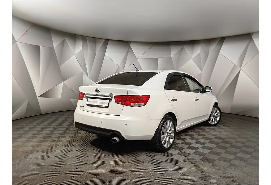 Kia Cerato 2.0 AT (150 л.с.) Белый в АВИЛОН. Слайд №2